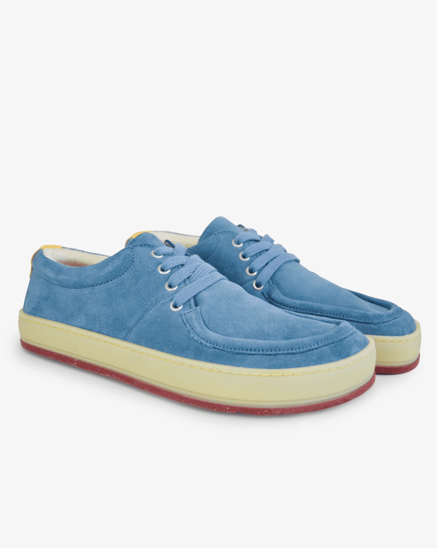 Men's barefoot wallabee Aurox Blue Mirage in blue leather with translucent gum sole, angled pair view on white background