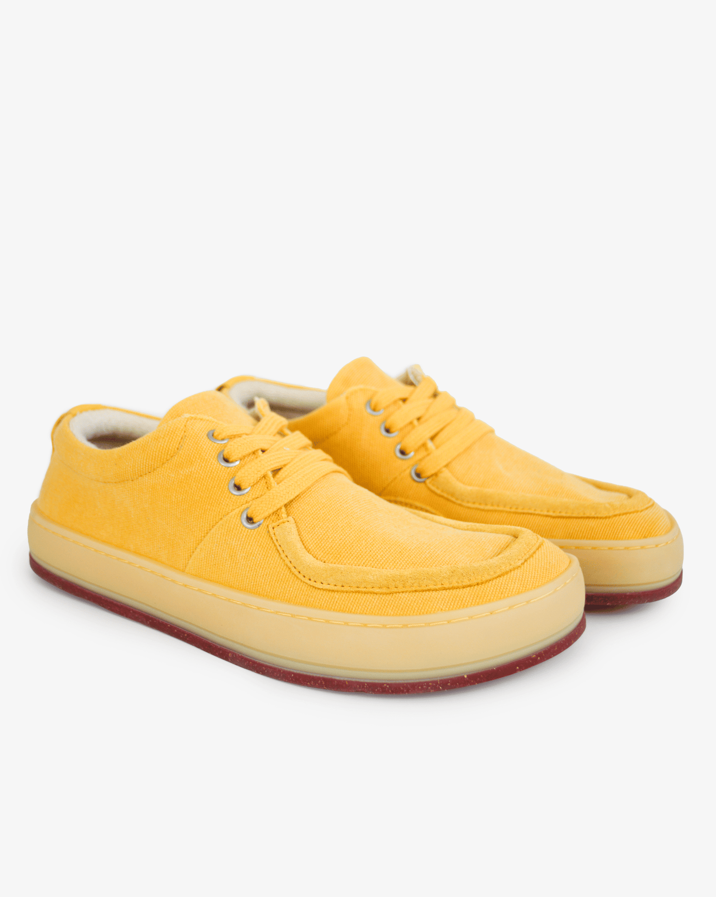 Women's barefoot wallabee Aurox Citrus in yellow canvas with translucent gum sole, pair view on white background